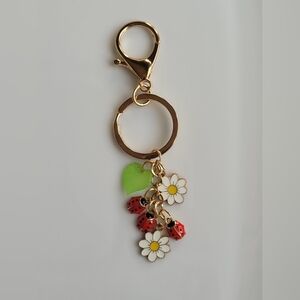 New Gold Tone Keychain with Ladybug and Daisy Charms
